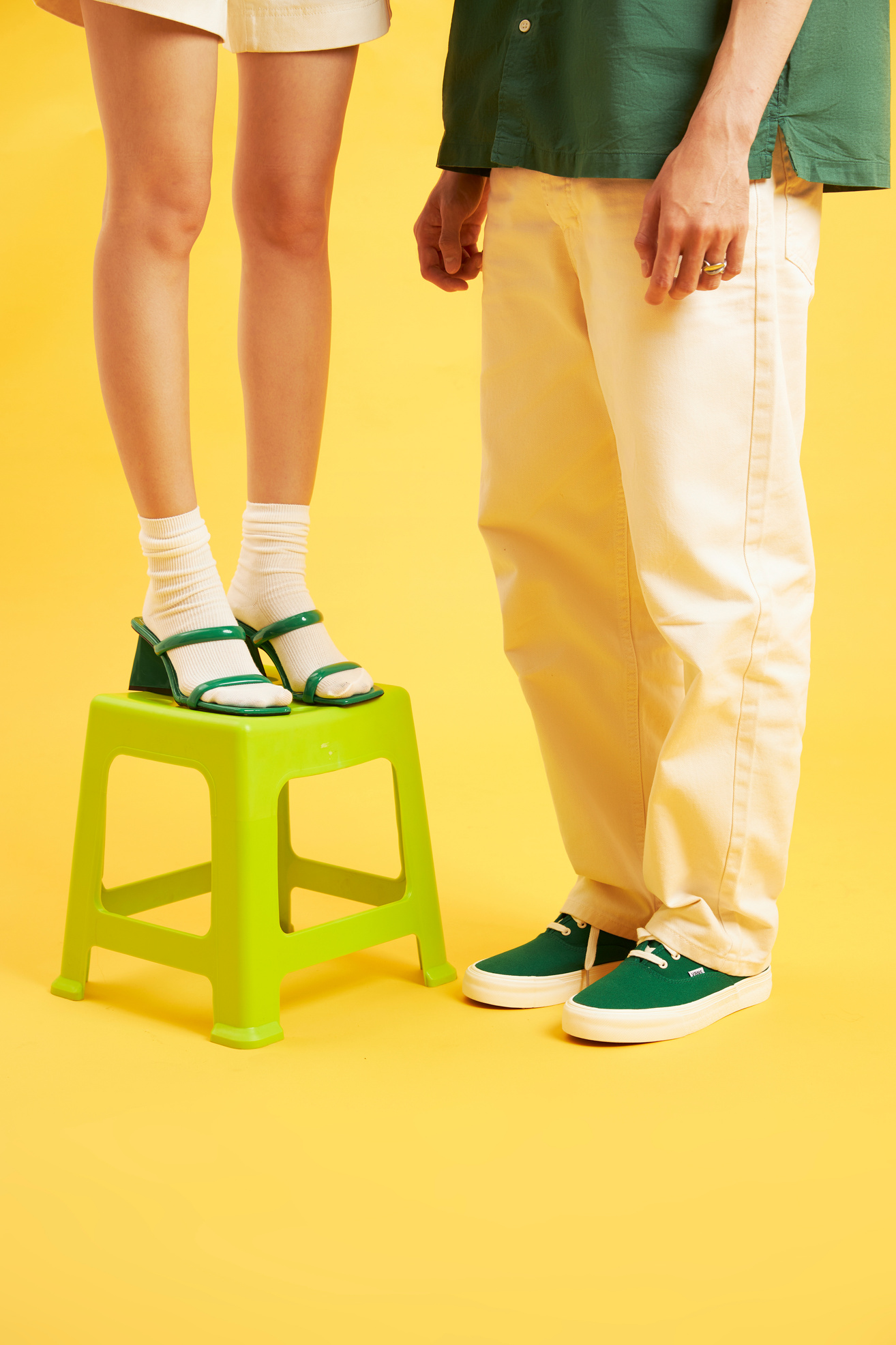 Man and Woman in Green Footwear