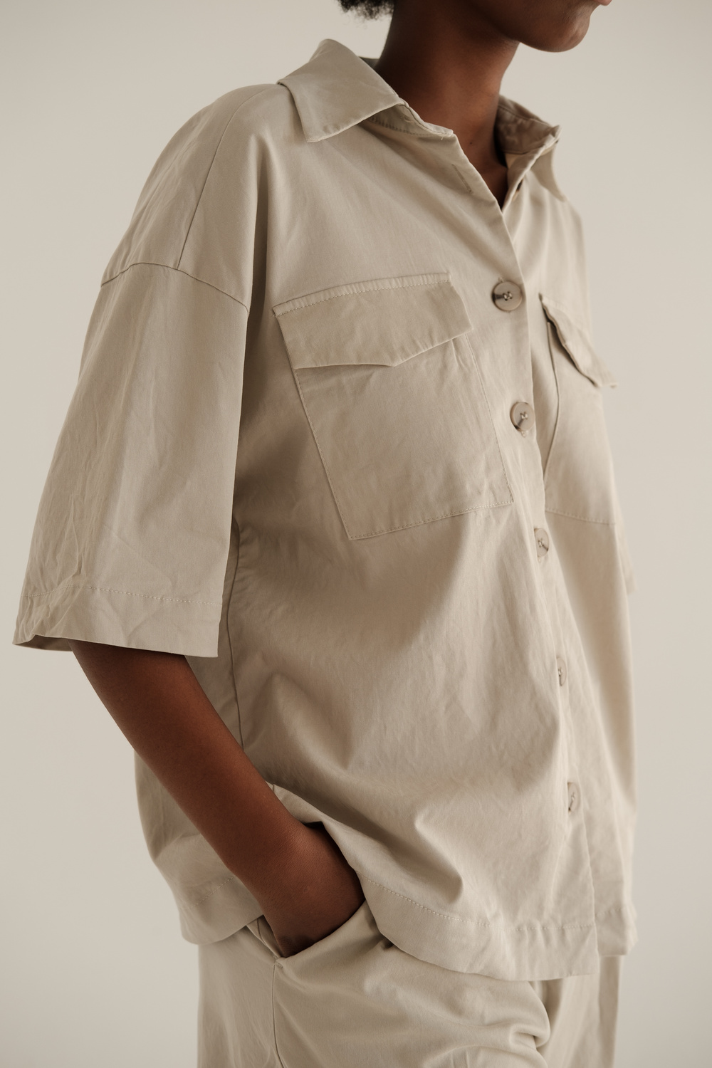 Woman in Casual Shirt and Shorts