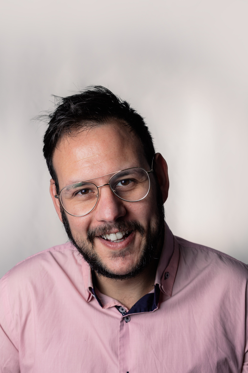 Portrait of a Smiling Man with Eyeglasses