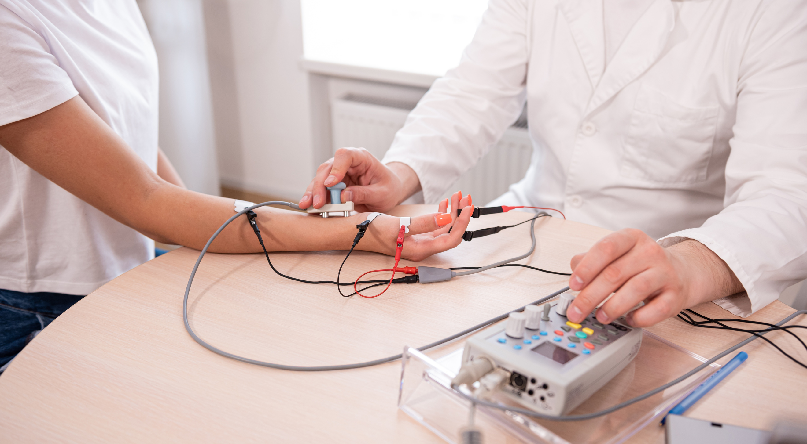 Patient nerves testing using electromyography at medical center