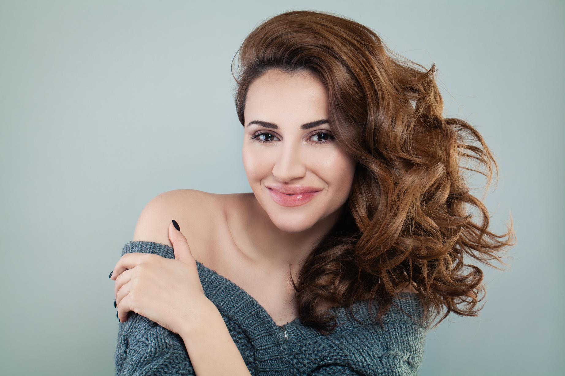 Smiling Model Woman with Red Curly Hair